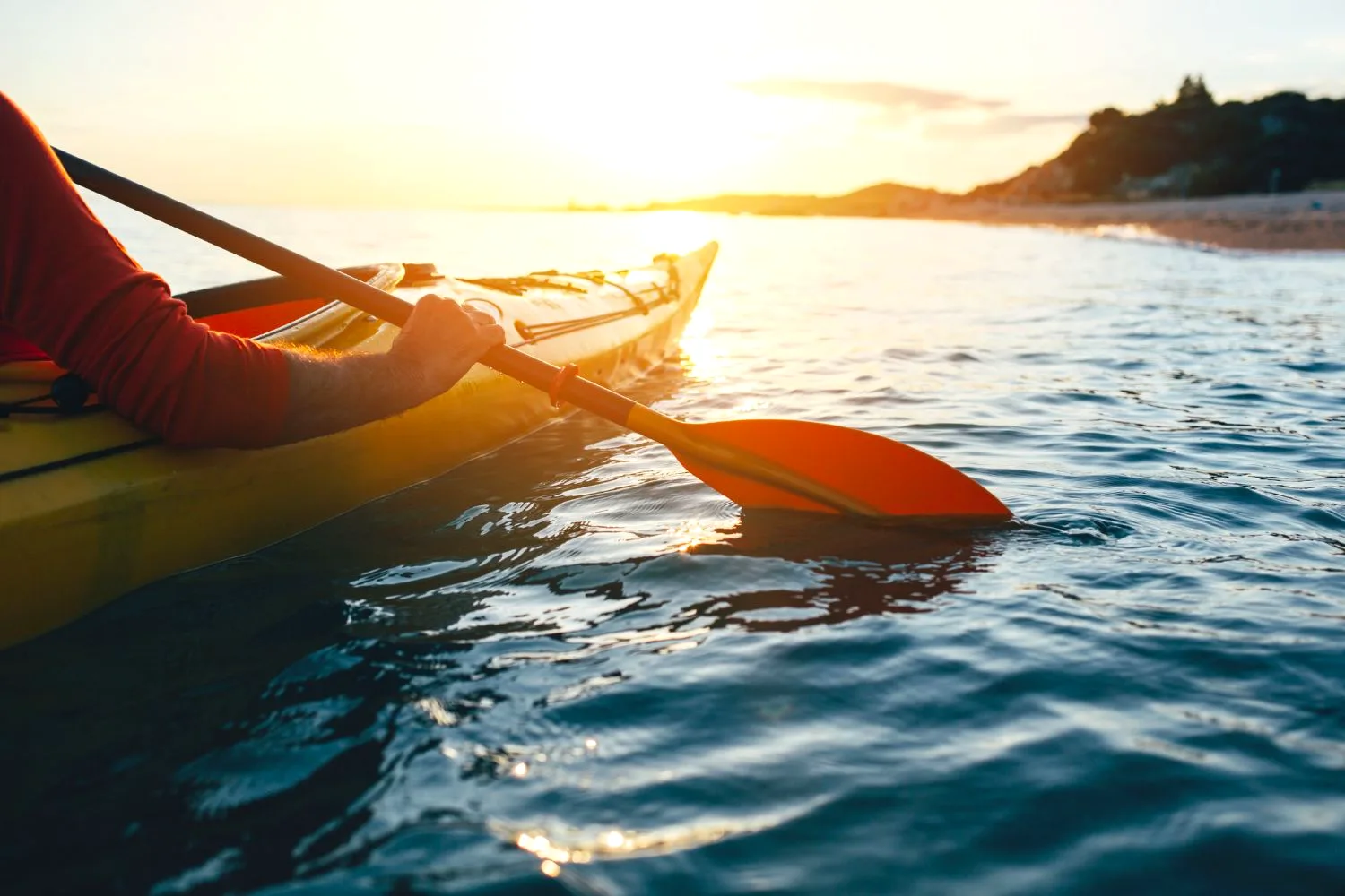 Sea kayaking along the Istrian coast at sunset, Croatia