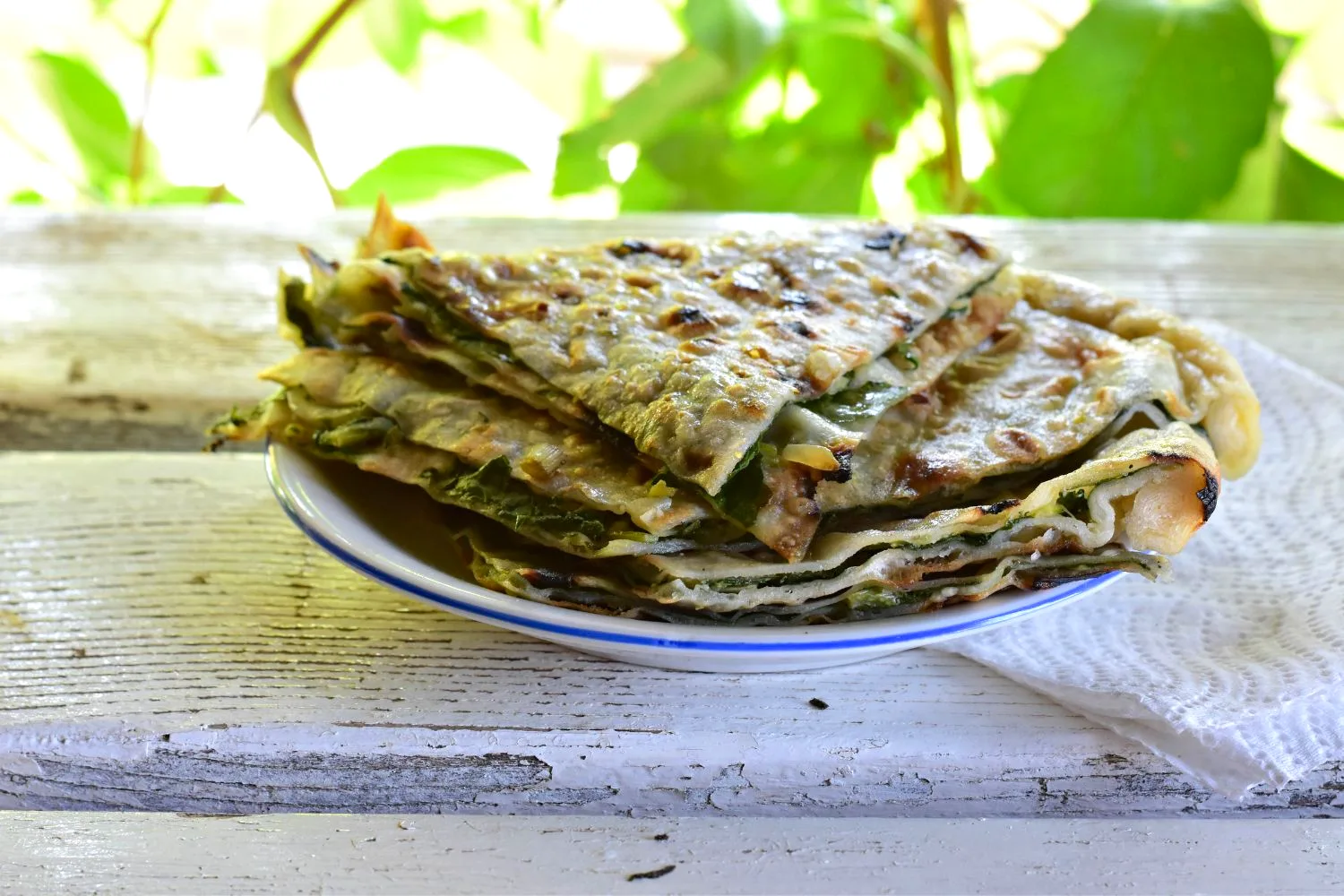 A plate of freshly baked soparnik, the traditional Dalmatian Swiss chard pie, Croatia