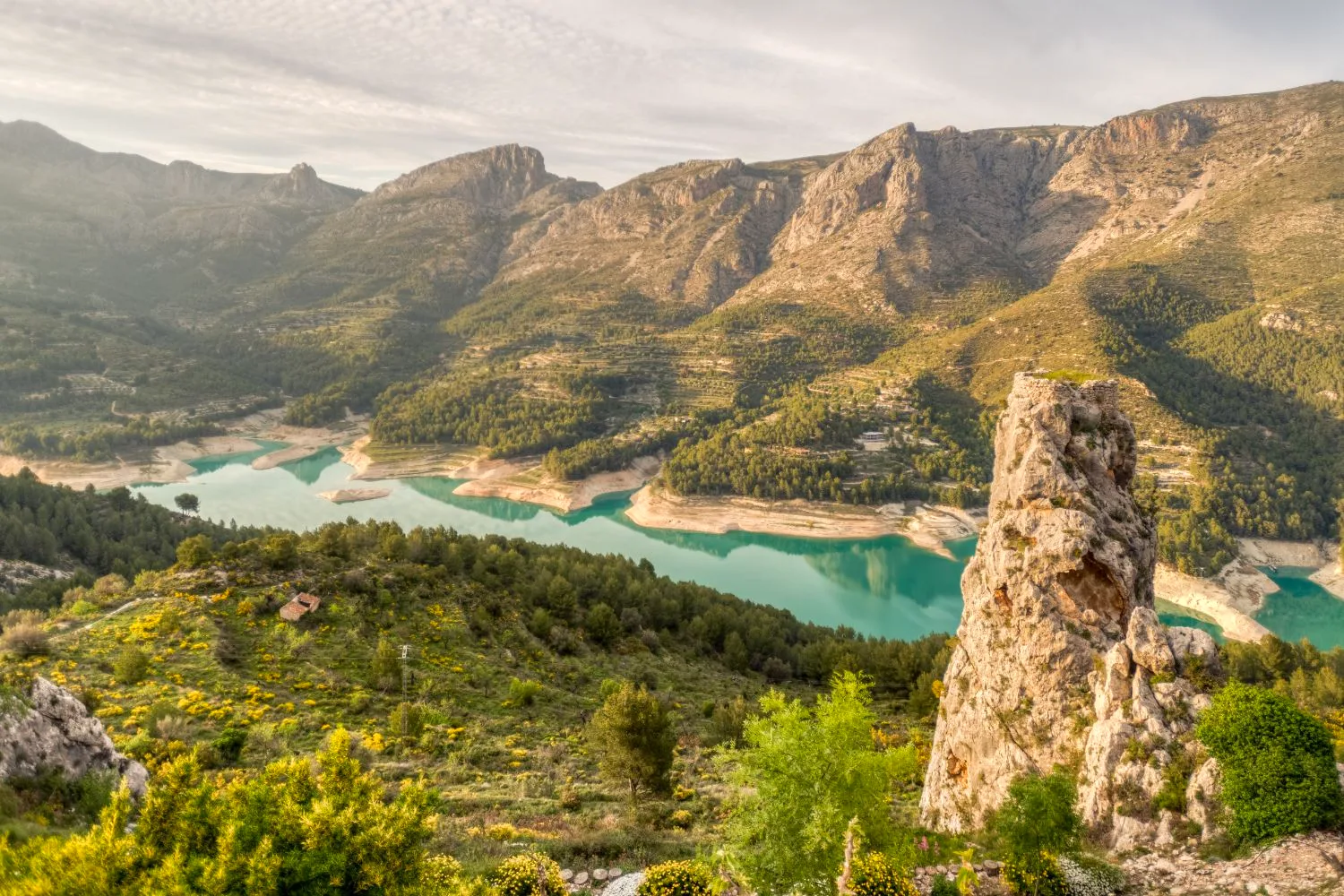 Guadalest hilltop village and turquoise reservoir, Costa Blanca, Spain