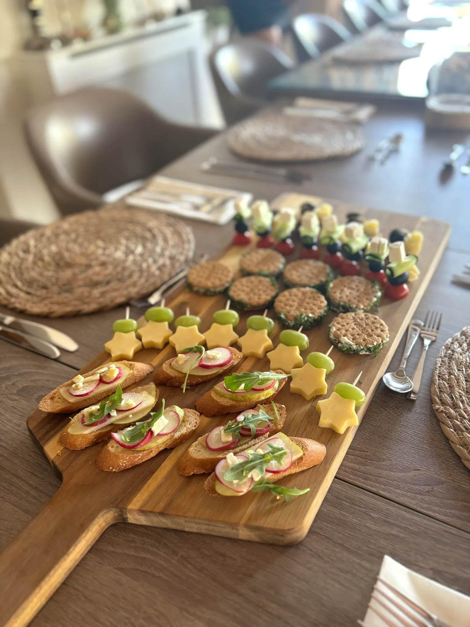 Canapé board with cheese and crostini served at the Oodles villa, Spain