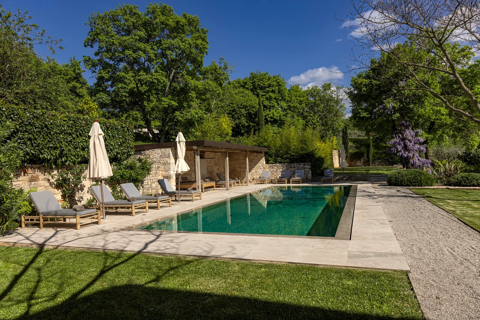 Pool terrace with sun loungers at the Istria retreat villa, Croatia