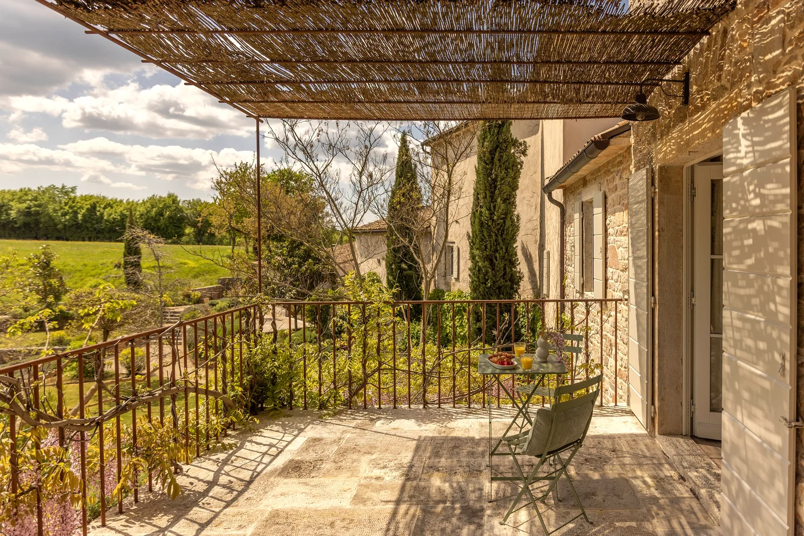 Breakfast laid out on the pergola terrace at Villas Prašćari, Istria, Croatia