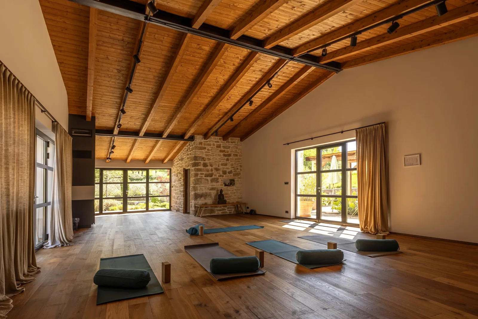 Wood-beamed yoga and Pilates studio at the Istria retreat villa, Croatia