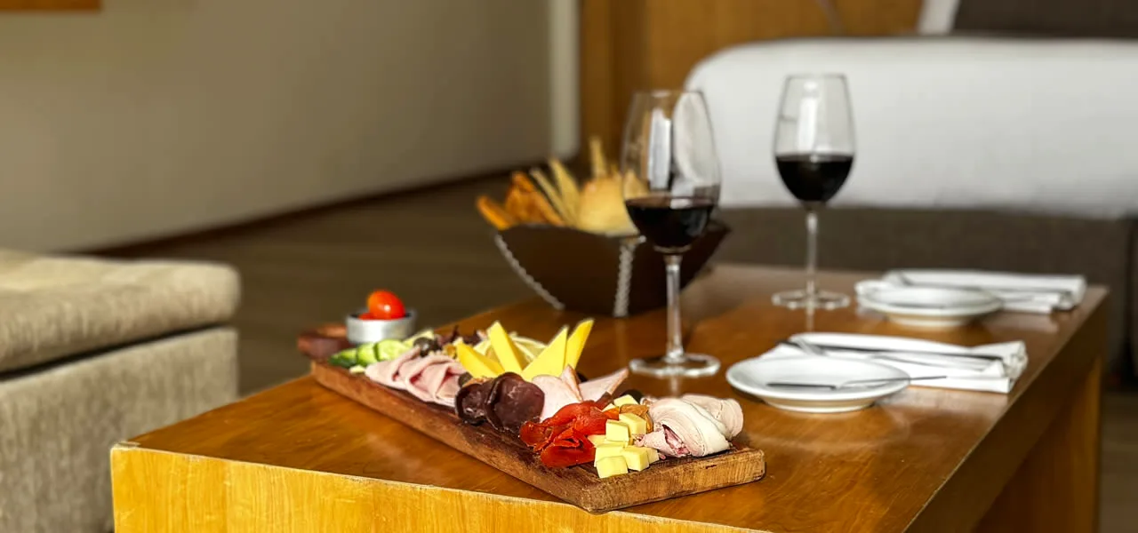 Wine and cheese platter at Design Suites Bariloche, Argentina