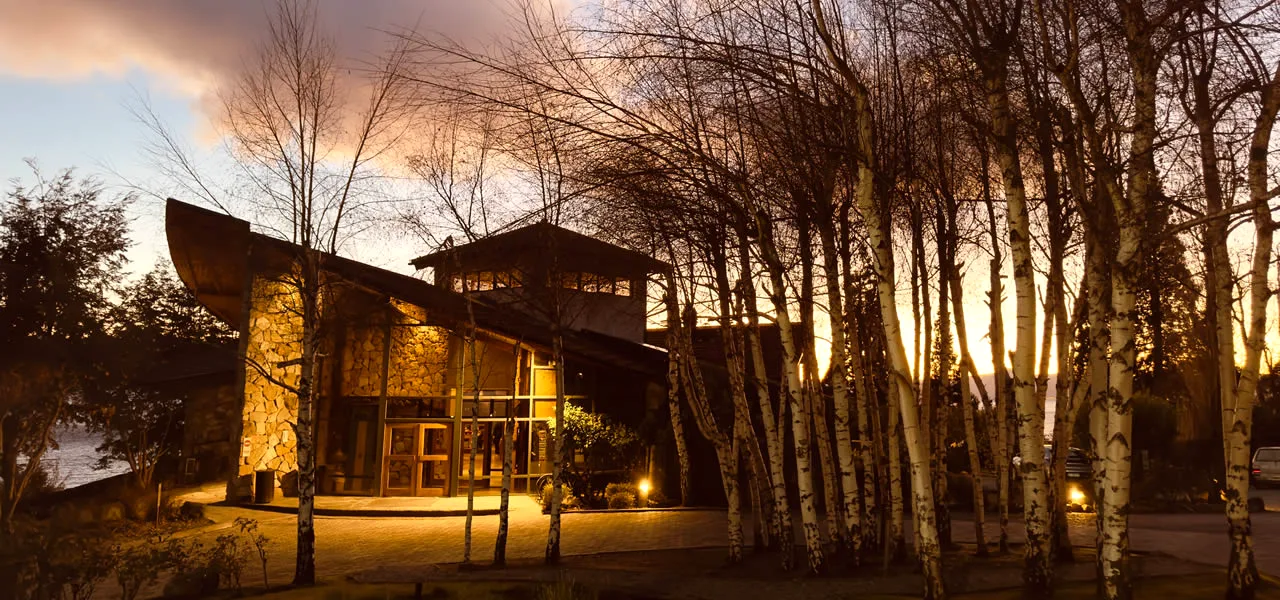 Design Suites Bariloche at sunset among birch trees, Bariloche, Argentina