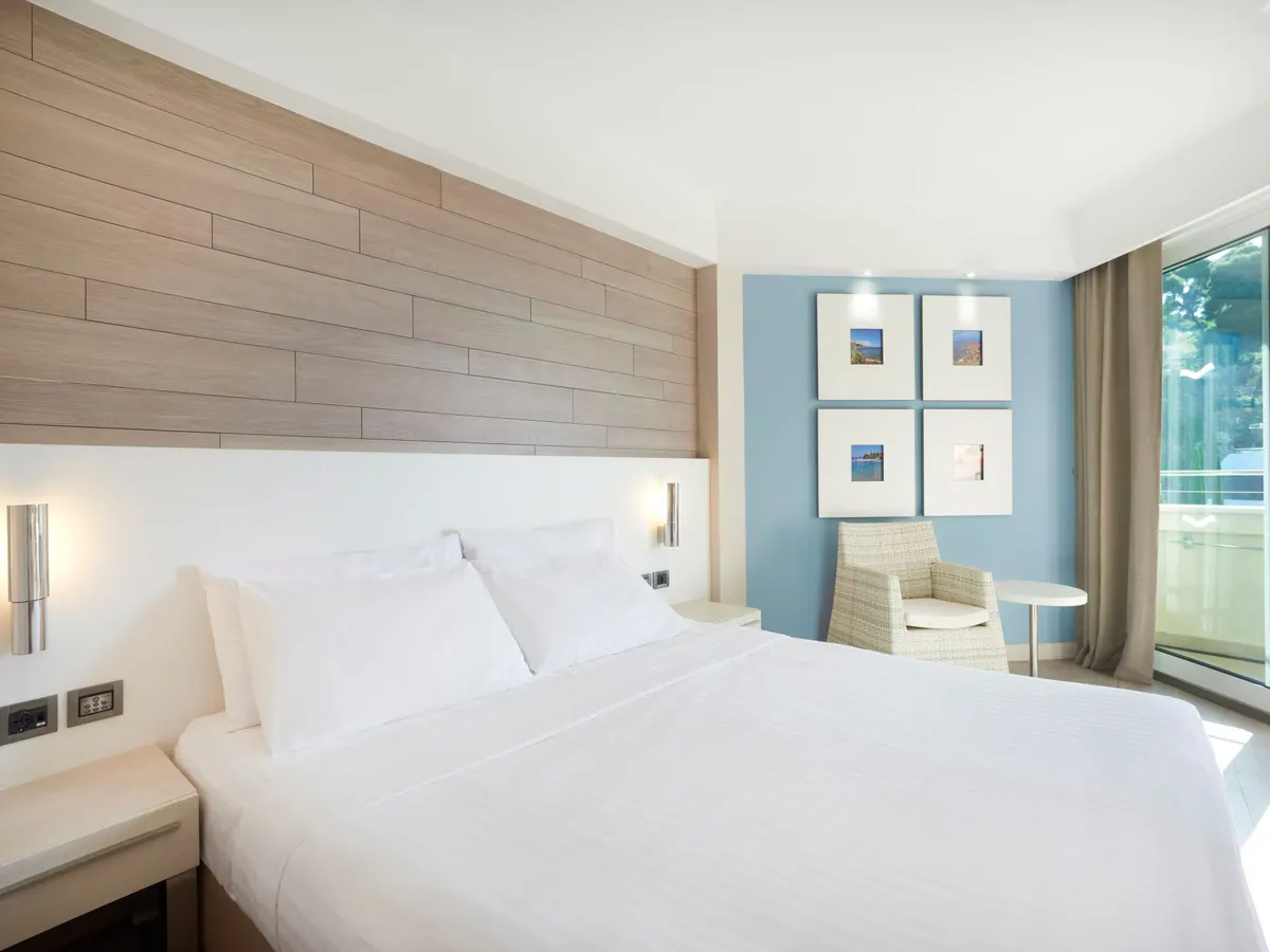Guest room with a sea-view balcony at Hilton Lopud Beach Resort, Croatia