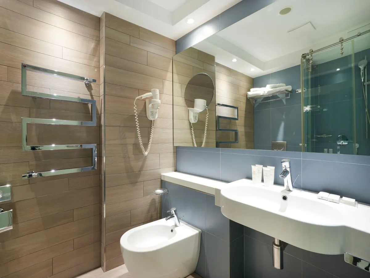 Modern bathroom with a walk-in shower at Hilton Lopud Beach Resort, Croatia