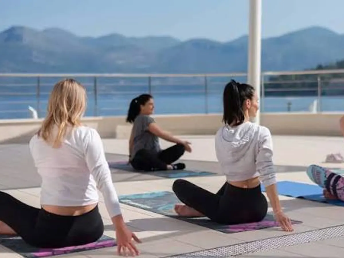 Group yoga class on a rooftop terrace at Hilton Lopud Beach Resort, Croatia