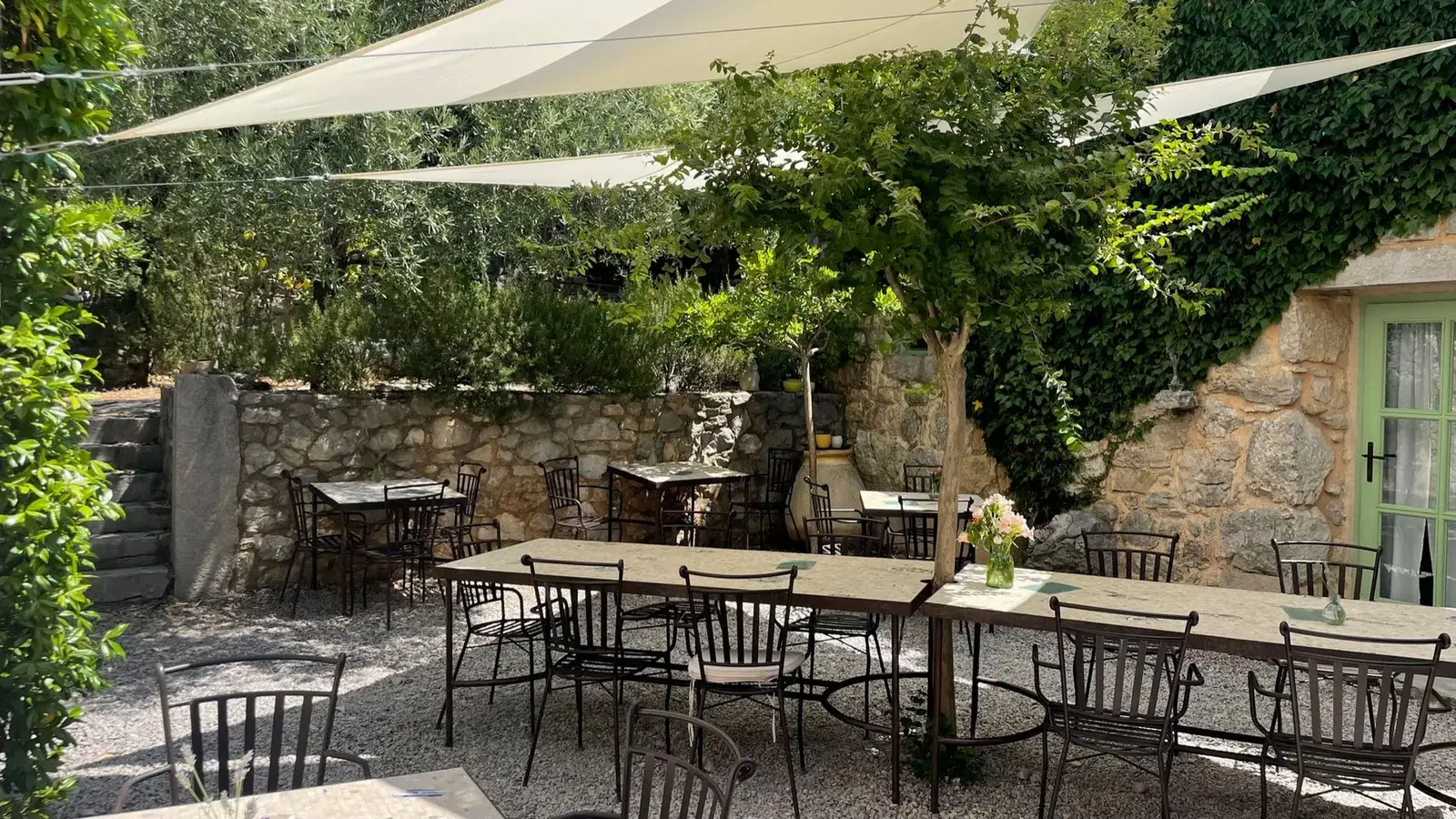 Outdoor dining terrace under sail shades at Hotel Balatura, Vinodol Valley, Croatia