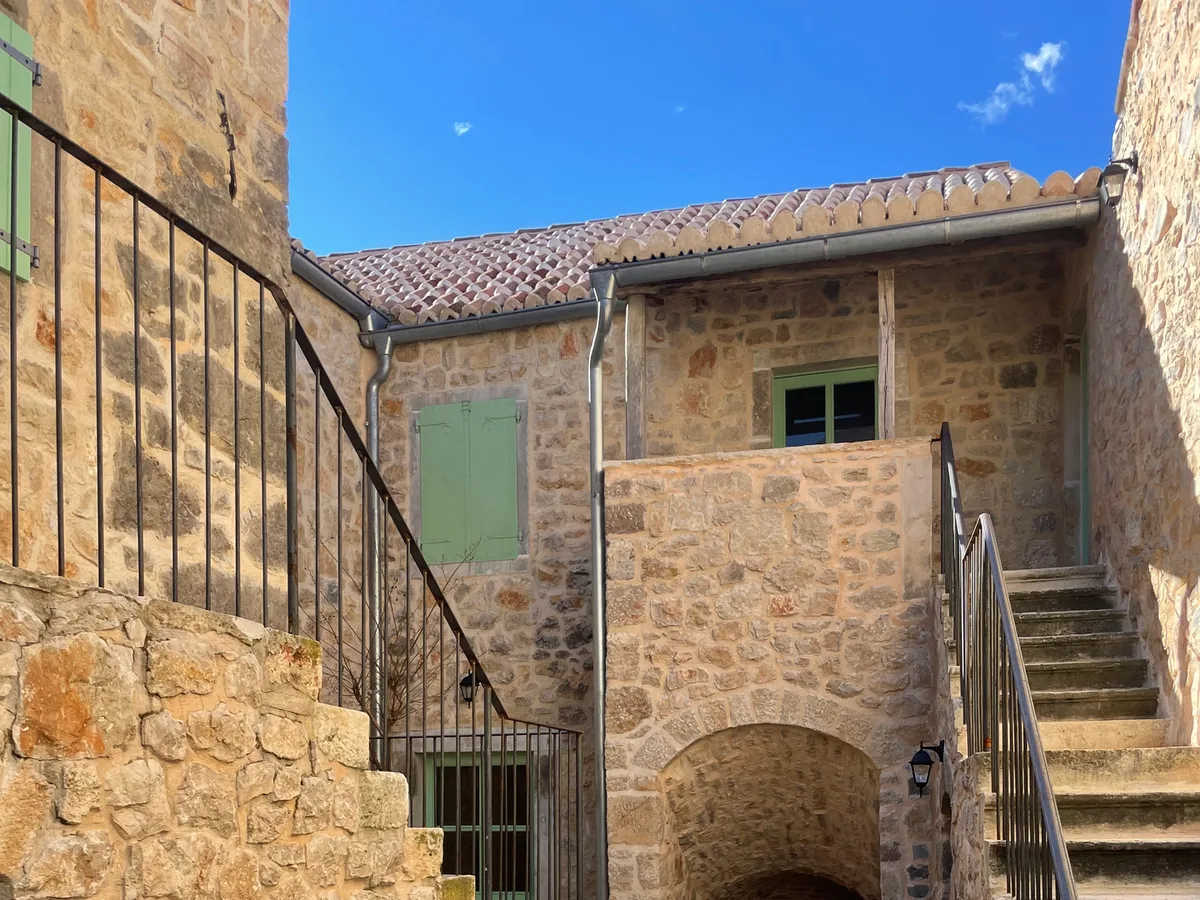 Stone alley through the restored village at Hotel Balatura, Tribalj, Croatia