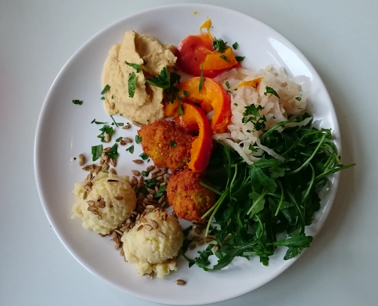 Vegetarian plate with hummus, falafel, roasted peppers and arugula at B&B Dela, Hvar Town, Croatia