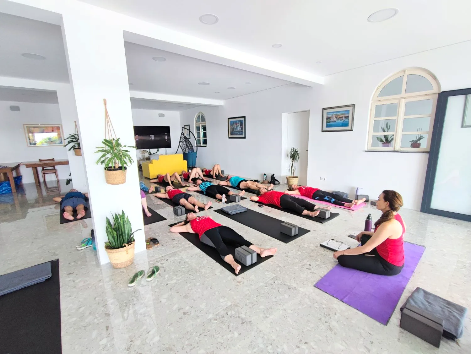 Yoga class in the indoor room opening onto the pool at B&B Dela, Hvar Town, Croatia