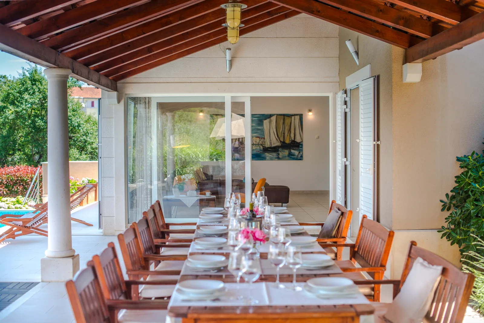 Covered terrace dining area at Villa Gumonca, Brač Island, Croatia