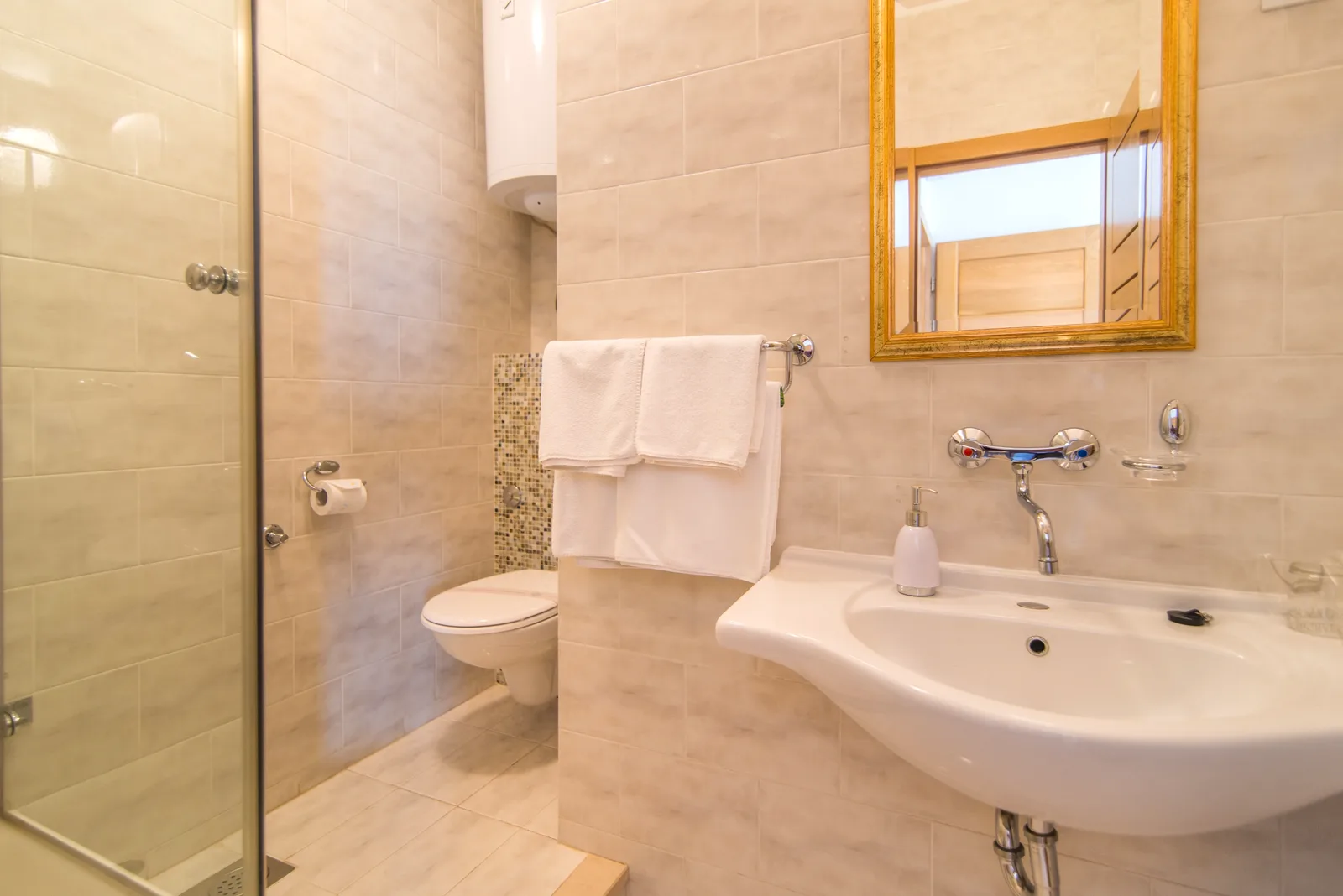 En-suite bathroom with a walk-in shower at Villa Mirca, Brač Island, Croatia