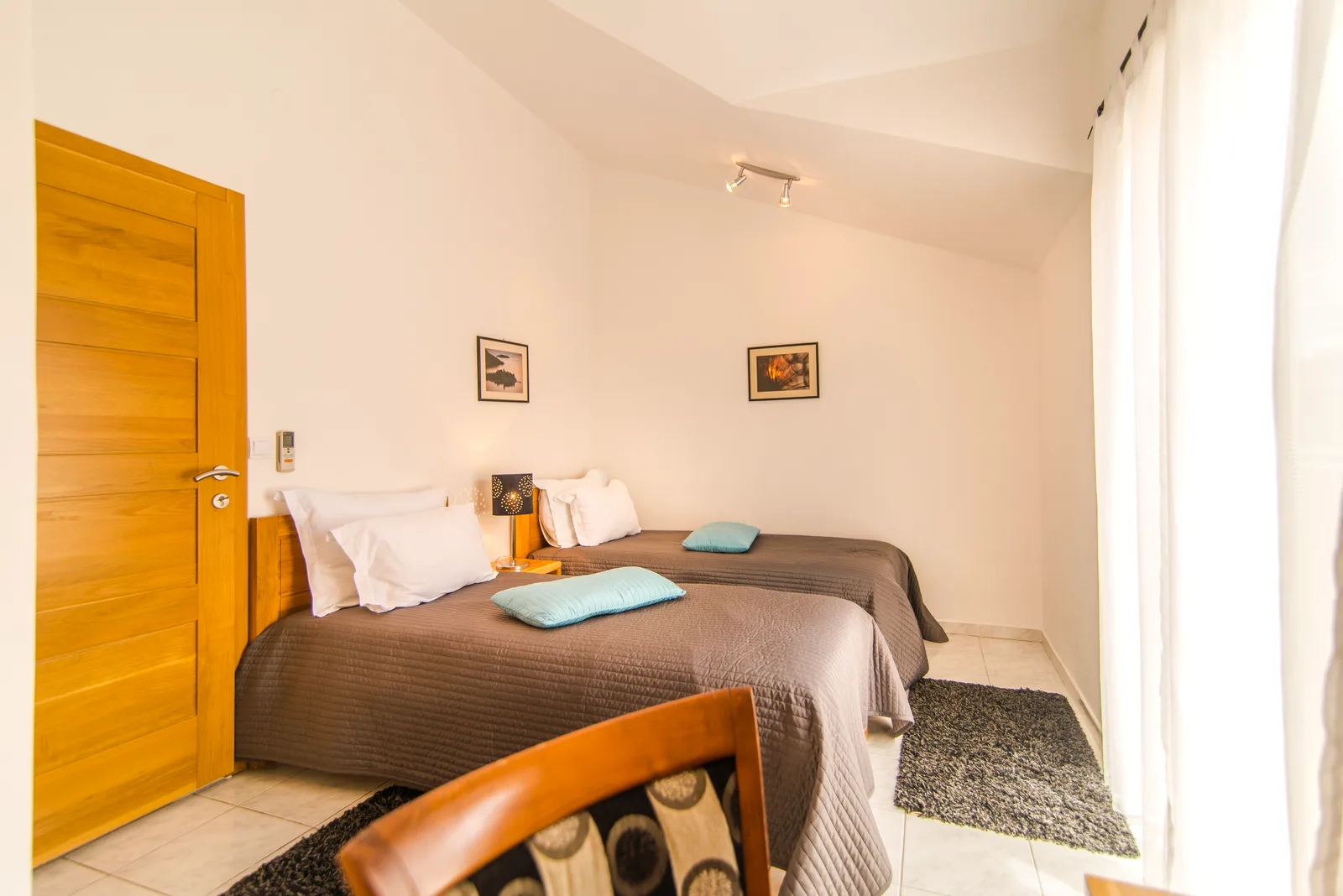 Twin bedroom with two single beds at Villa Mirca, Brač Island, Croatia