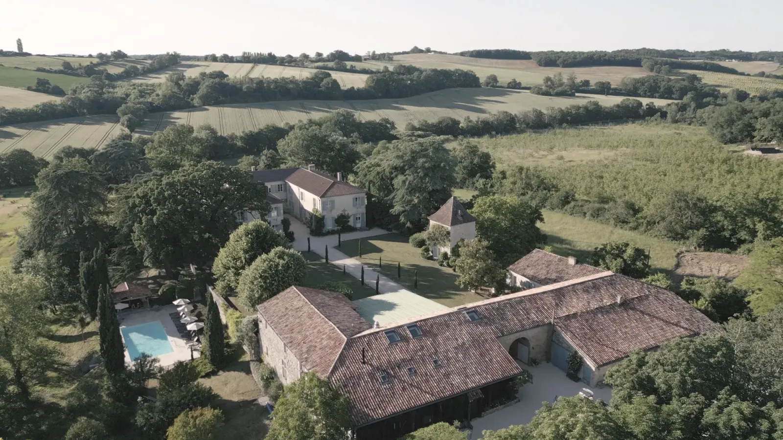 Aerial view of Château de Lassalle, its outbuildings and grounds in Lot-et-Garonne, France