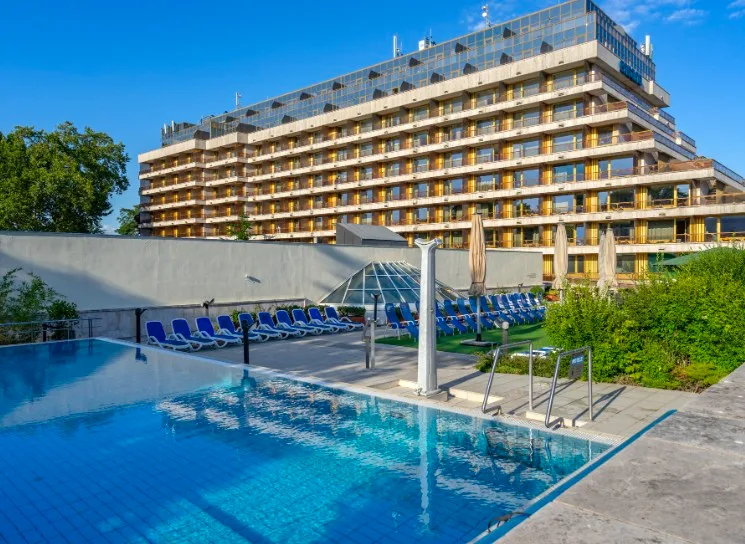 Rooftop pool with a view of Margaret Island's water tower at Ensana Thermal Margaret Hotel