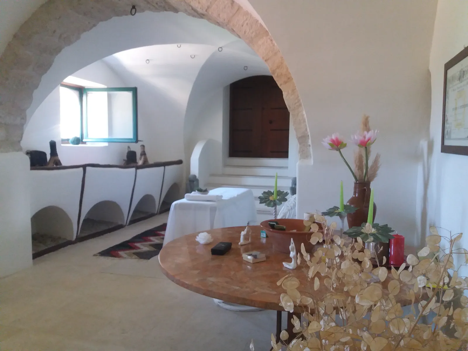 Vaulted treatment room with a massage table at Sicilian Spirit, Sicily