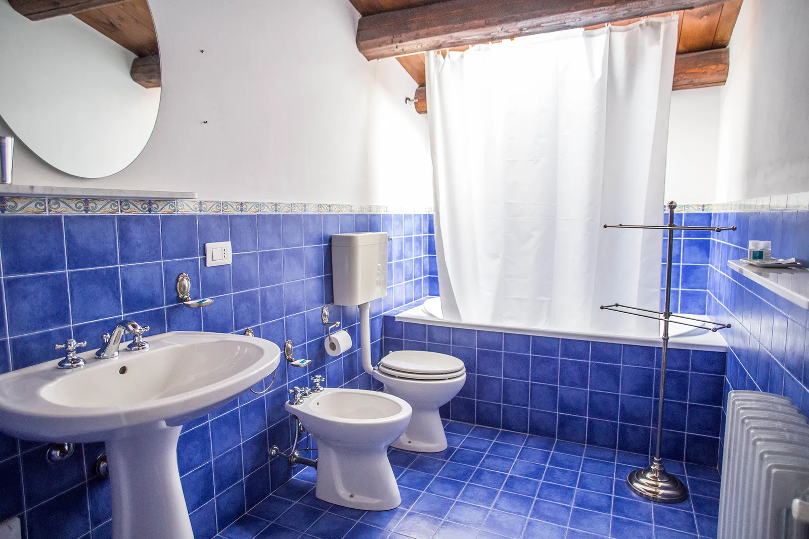 Bathroom with blue tiles at Sicilian Spirit, Sicily