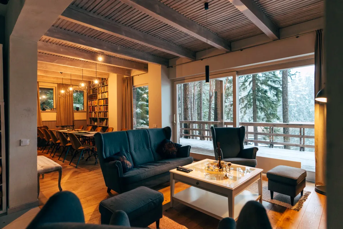Library, lounge and dining area in Big House at Šiaurys Resort, Lithuania