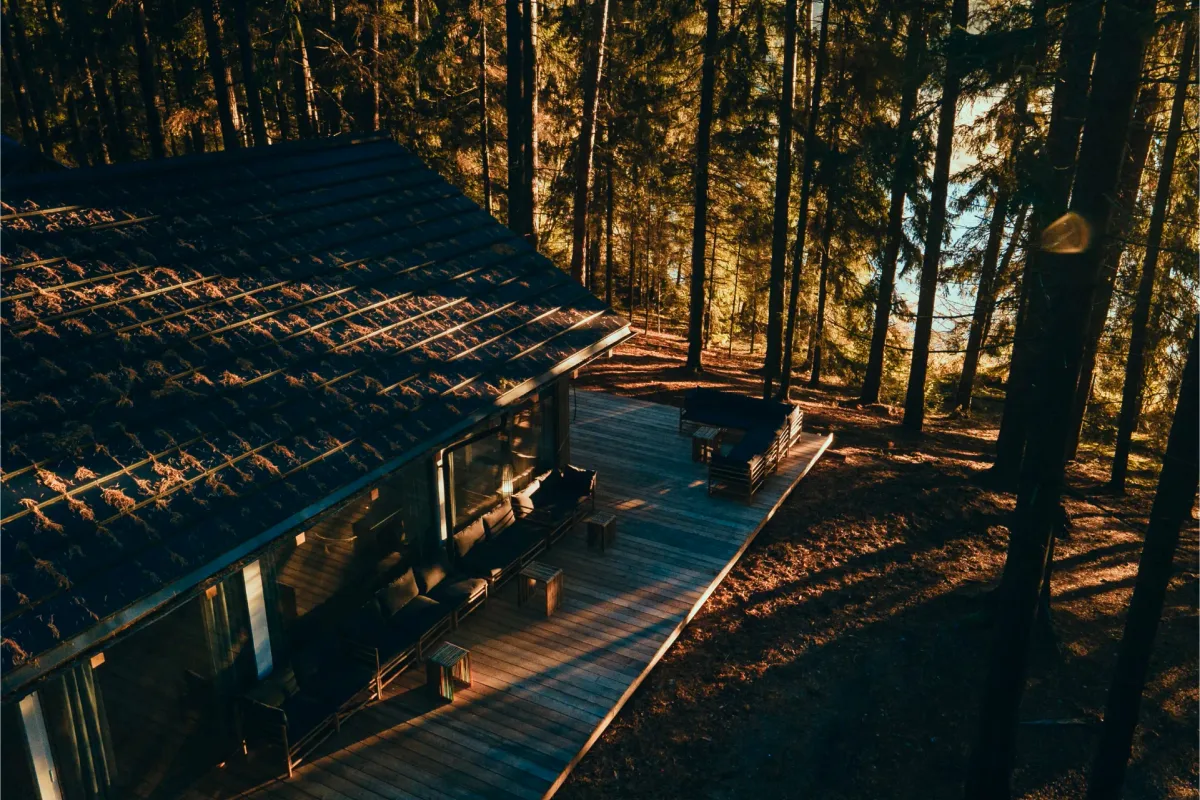 Covered deck of the activities house overlooking the forest at Šiaurys Resort, Lithuania