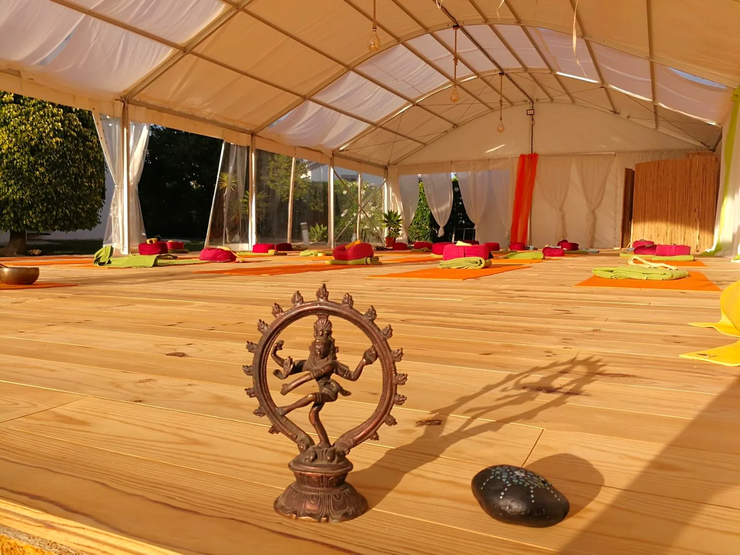 Covered open-air yoga tent with a wooden deck floor at Villa Vale a Pena, Algarve, Portugal