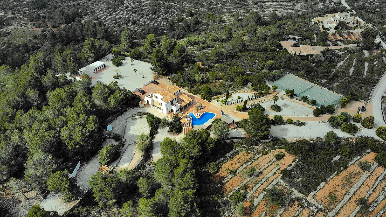 Aerial view of the Oodles villa estate with pool and tennis court, Costa Blanca, Spain