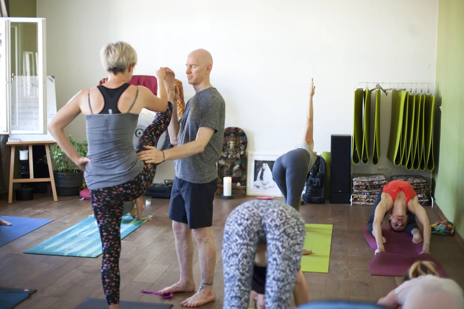 Eddie Stern adjusting a student during an Ashtanga yoga workshop, Croatia